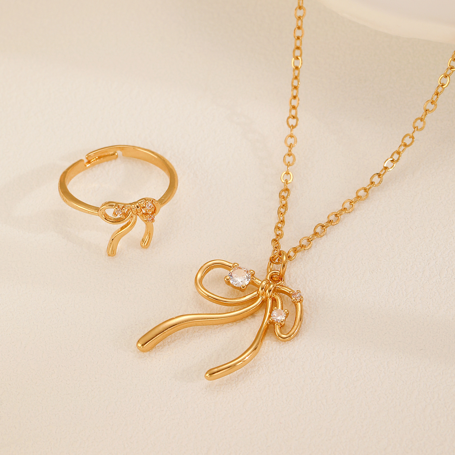 European and American cross-border ins Zircon bow earrings, earrings, rings, necklaces, women's jewelry set, high-end three-piece set Application Scenario