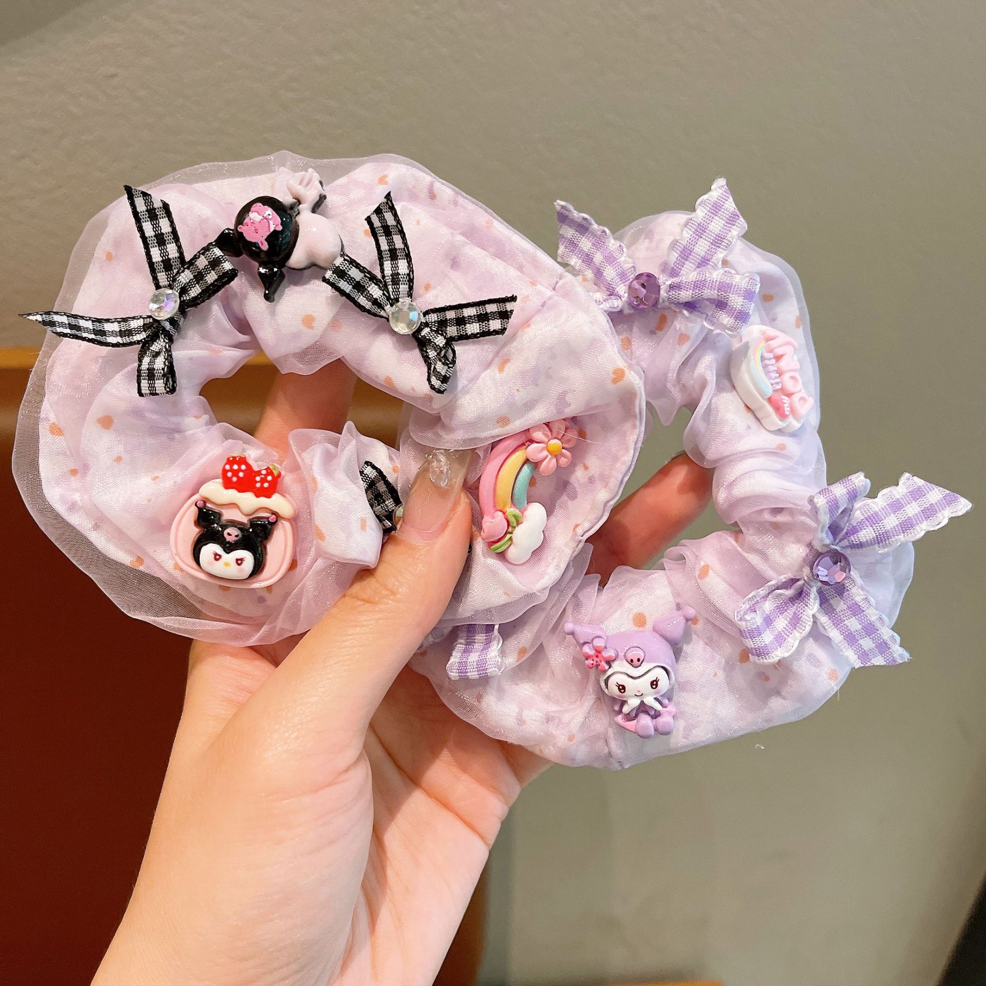 The cute Kuromi hair band for children's large intestine is not harmful to girls' hair and has good elasticity. It can be used as a ponytail headwear or hair tie for babies full figure