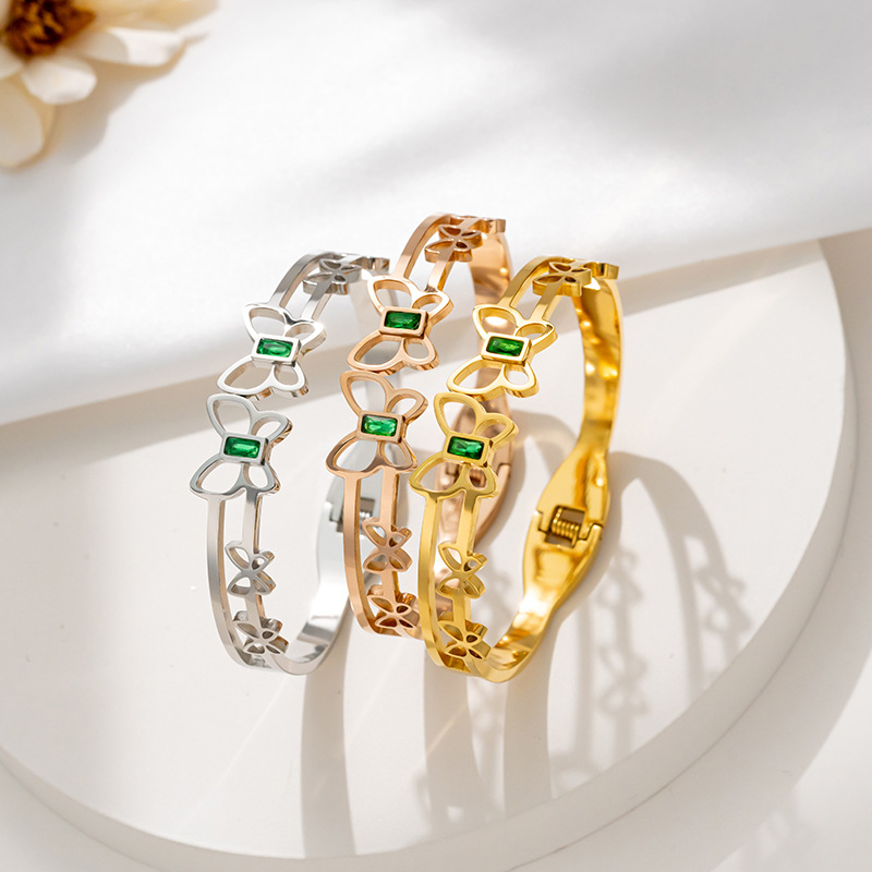 The non-fading hollowed-out green diamond butterfly titanium steel bracelet is a fashionable and versatile light luxury wristband for women. It is a simple and elegant internet-famous jewelry full figure