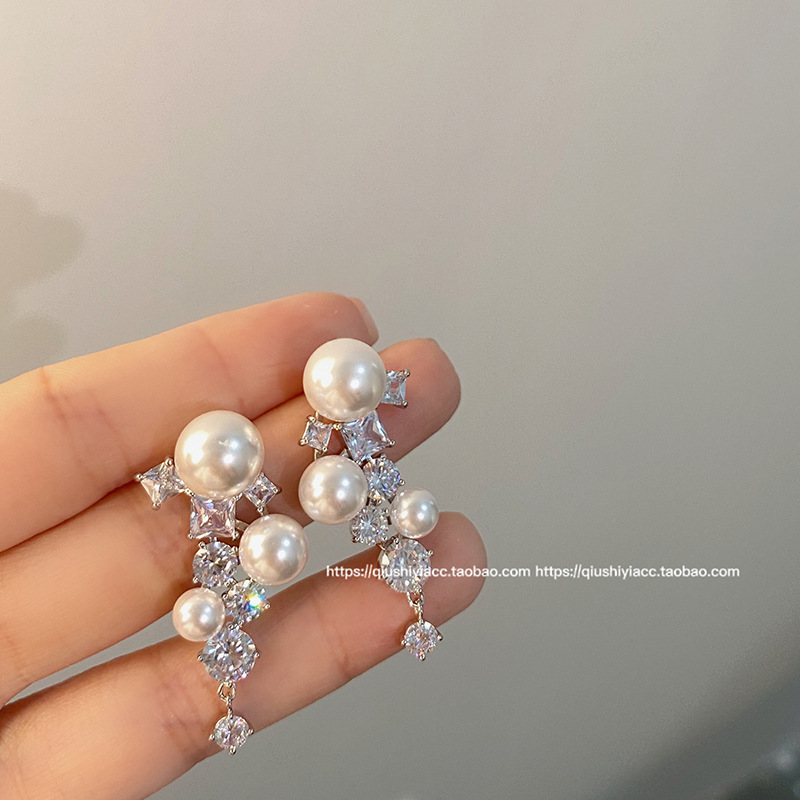 S925 Silver Needle new fashionable and versatile pearl earrings, a niche design for women, high-priced zircon tassel stud earrings full figure