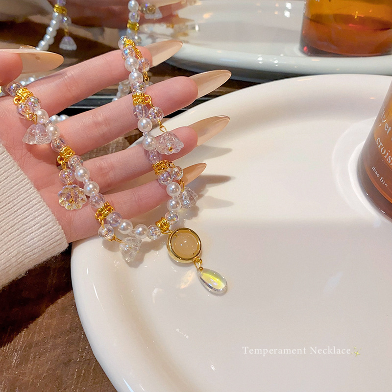 Water drop pearl beaded tassel necklace for women, light luxury, niche and high-end, with a collarbone chain feel and elegant style, autumn and winter sweater chain accessory details Picture