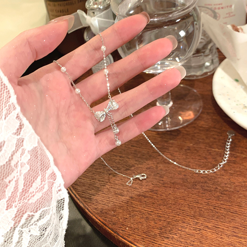 Bow tassel pearl necklace, women's light luxury, exquisite and high-end collarbone chain accessory, trendy bestseller, Internet celebrity necklace details Picture