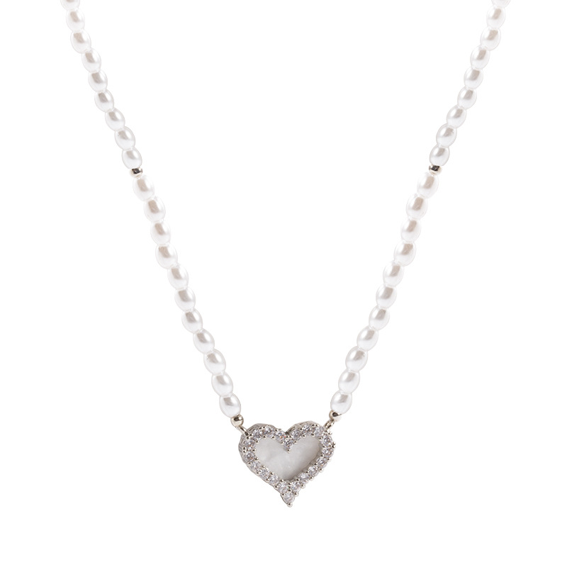 Korean exquisite sparkling diamond heart-shaped pearl necklace, women's light luxury and high-end feel, versatile and personalized collarbone chain necklace accessory Item Picture