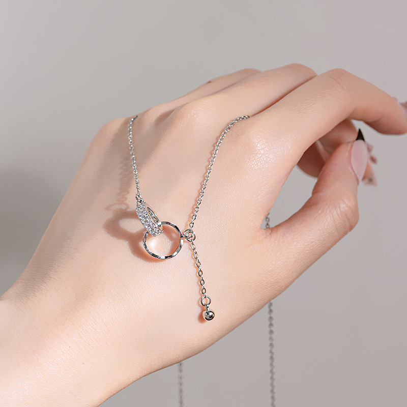 A silver full-diamond double-ring tassel necklace with a niche design sense from Japan and South Korea, a simple and light luxury style for women's collarbone chain fashion accessory Specification drawing
