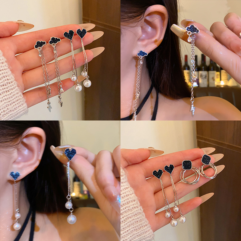 The micro-studded blue heart-shaped earrings with sparkling diamonds have a cold and unique design sense for women. The tassel pearl stud earrings are distinctive earrings full figure