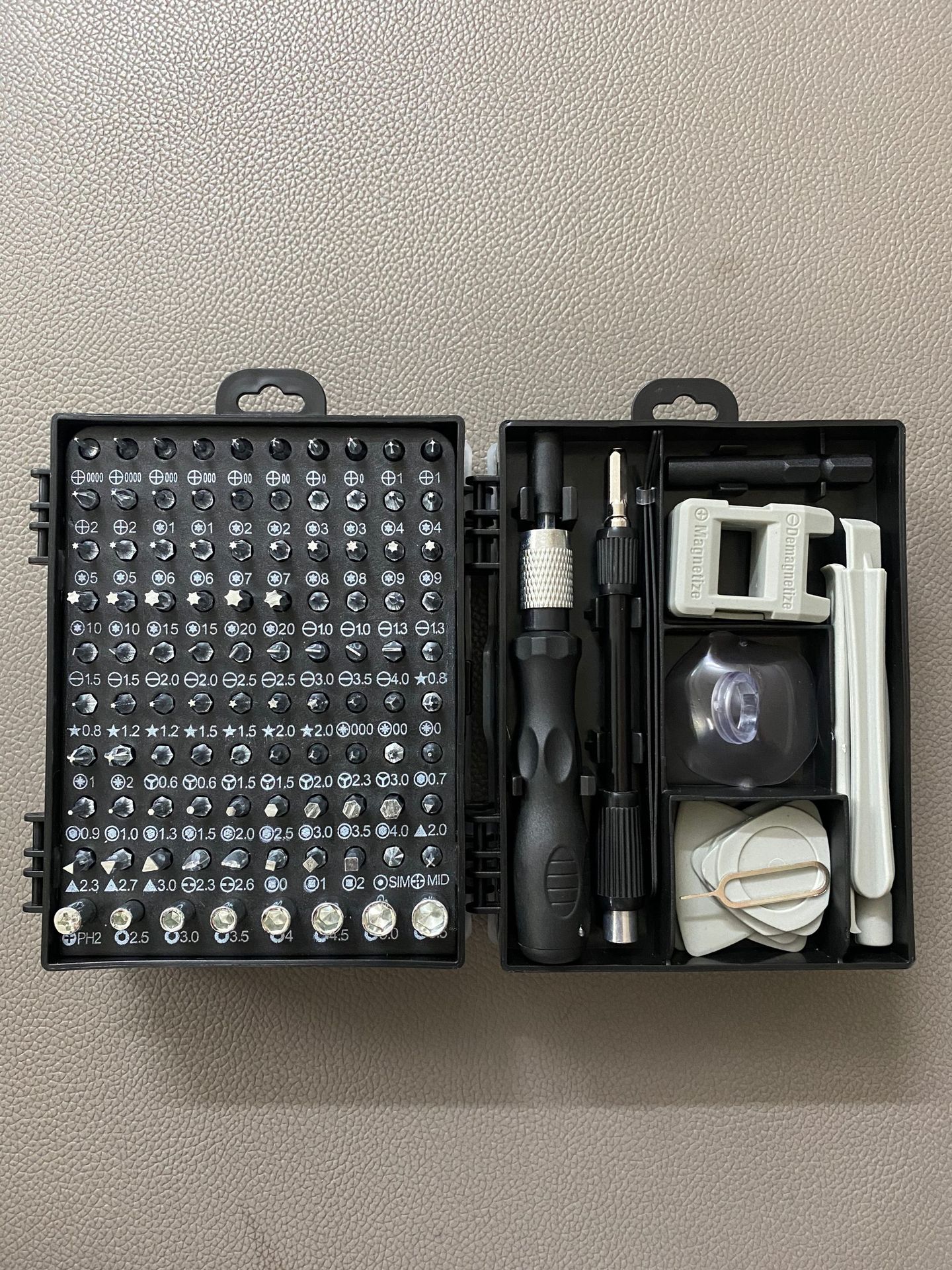 The 115-in-one multi-functional precision screwdriver set for mobile phones, watches, repair and hardware tools is selling well undefined