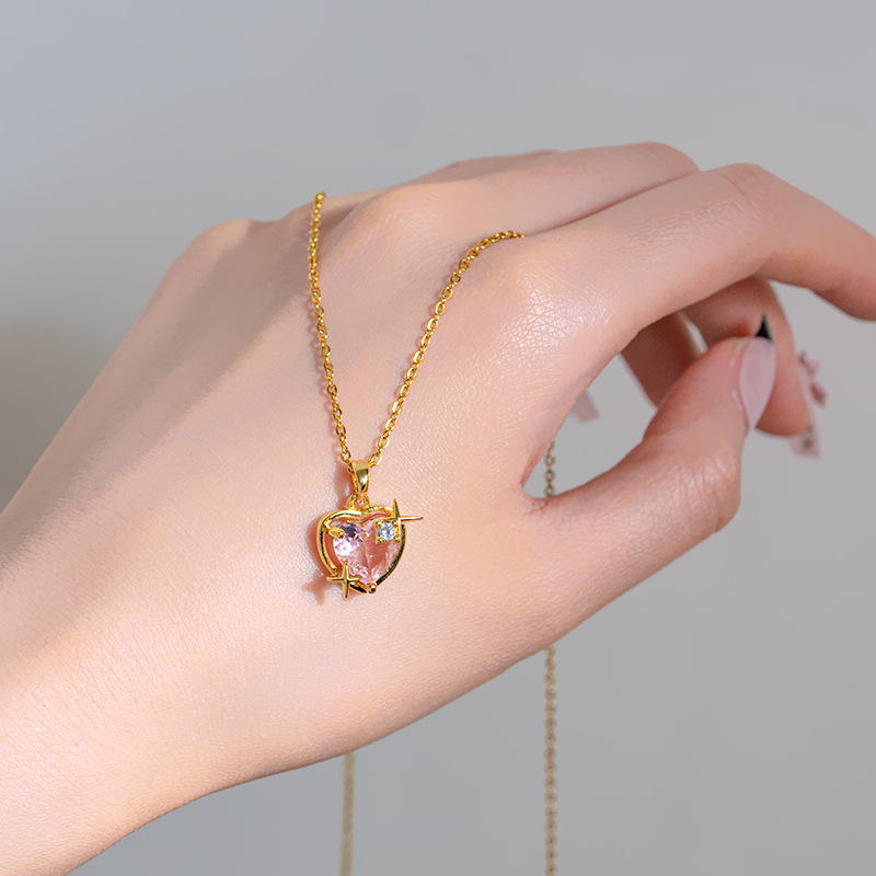 Wholesale of Korean version fashionable new pink heart-shaped zircon pendant titanium steel necklace, women's niche design sense starlight jewelry Application Scenario