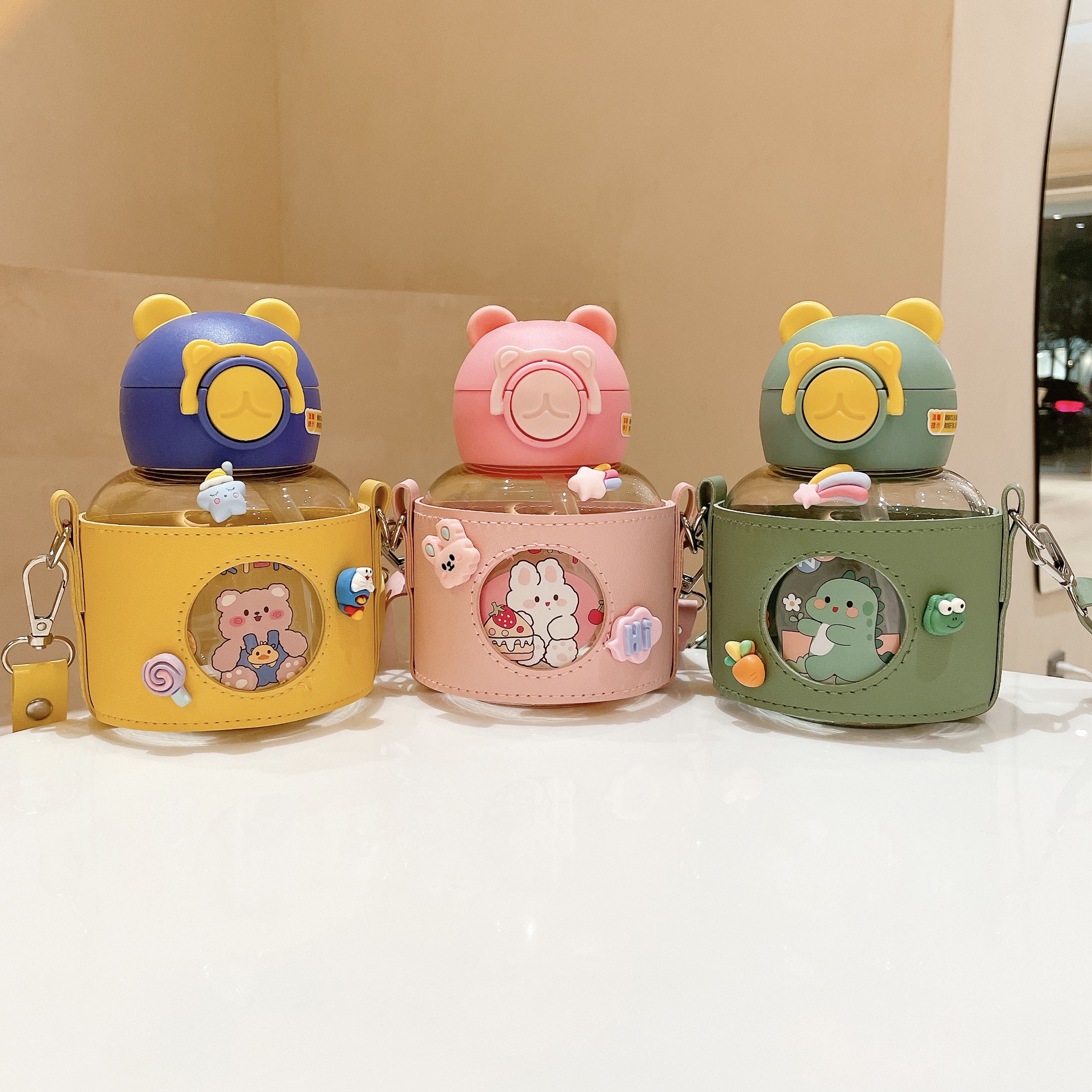 Leather case, large-belted cup with straw, portable and anti-drop children's straw cup, high appearance level for teenage girls, pop-up lid plastic baby water cup details Picture
