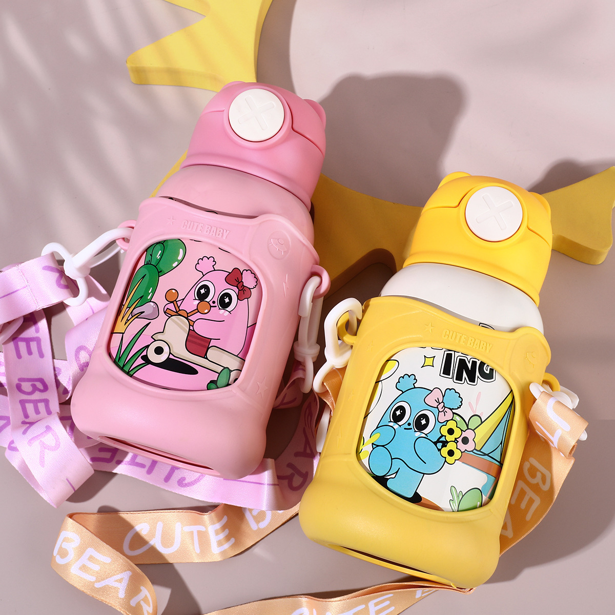 Customized 316 stainless steel children's insulated cup, one-click lid opening, bouncing straw cup, shoulder strap, student children's water bottle full figure