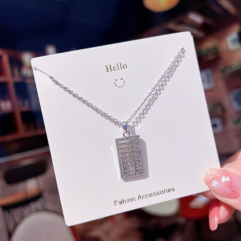 A light luxury Japanese and Korean pendant with a small abacus and titanium steel necklace, a fashionable collarbone chain by a female Internet celebrity, and a niche high-end accessory Specification drawing
