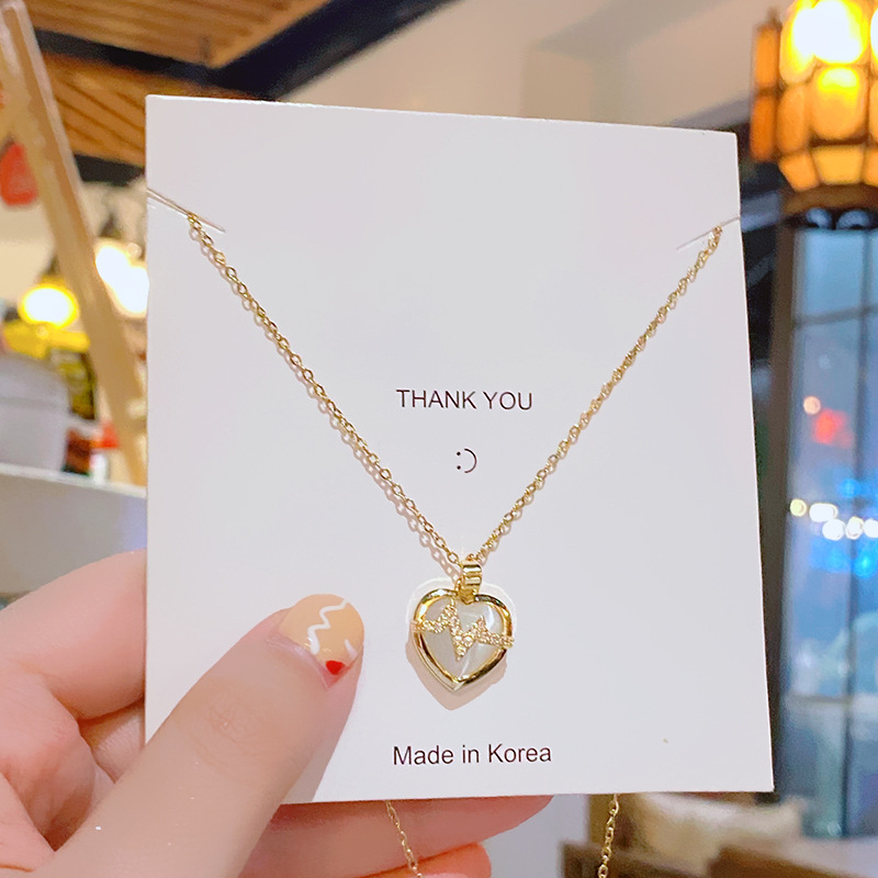 Fashionable and light luxury cat's eye stone heart-shaped titanium steel necklace, feminine zircon electrocardiogram pendant, Qixi Valentine's Day gift Application Scenario