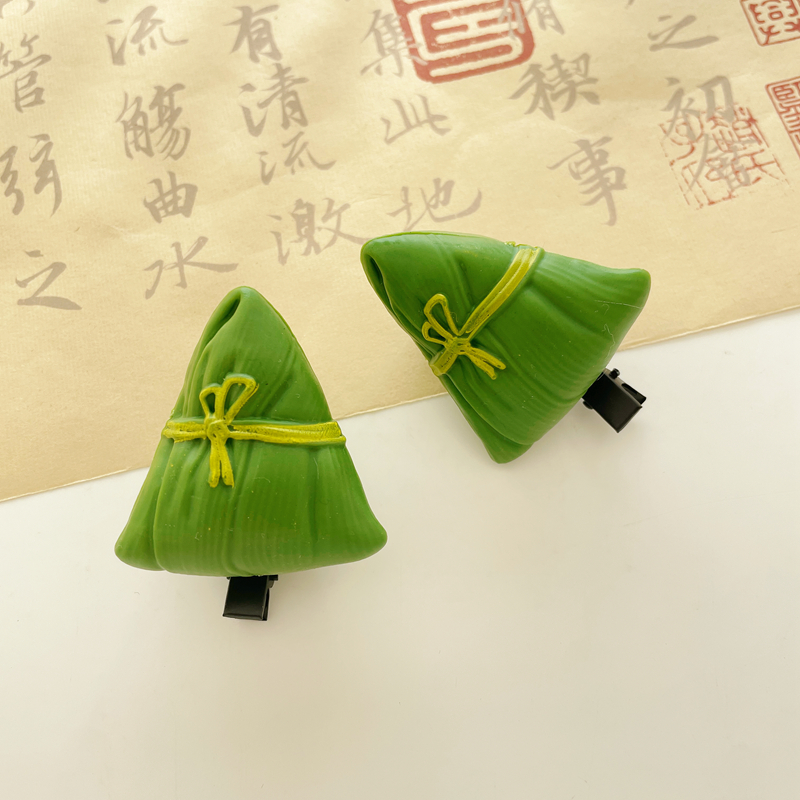 Creative and funny headwear for the Dragon Boat Festival: zongzi hairpins with bangs on the sides, cute meat zongzi hairpins with small clips for children full figure