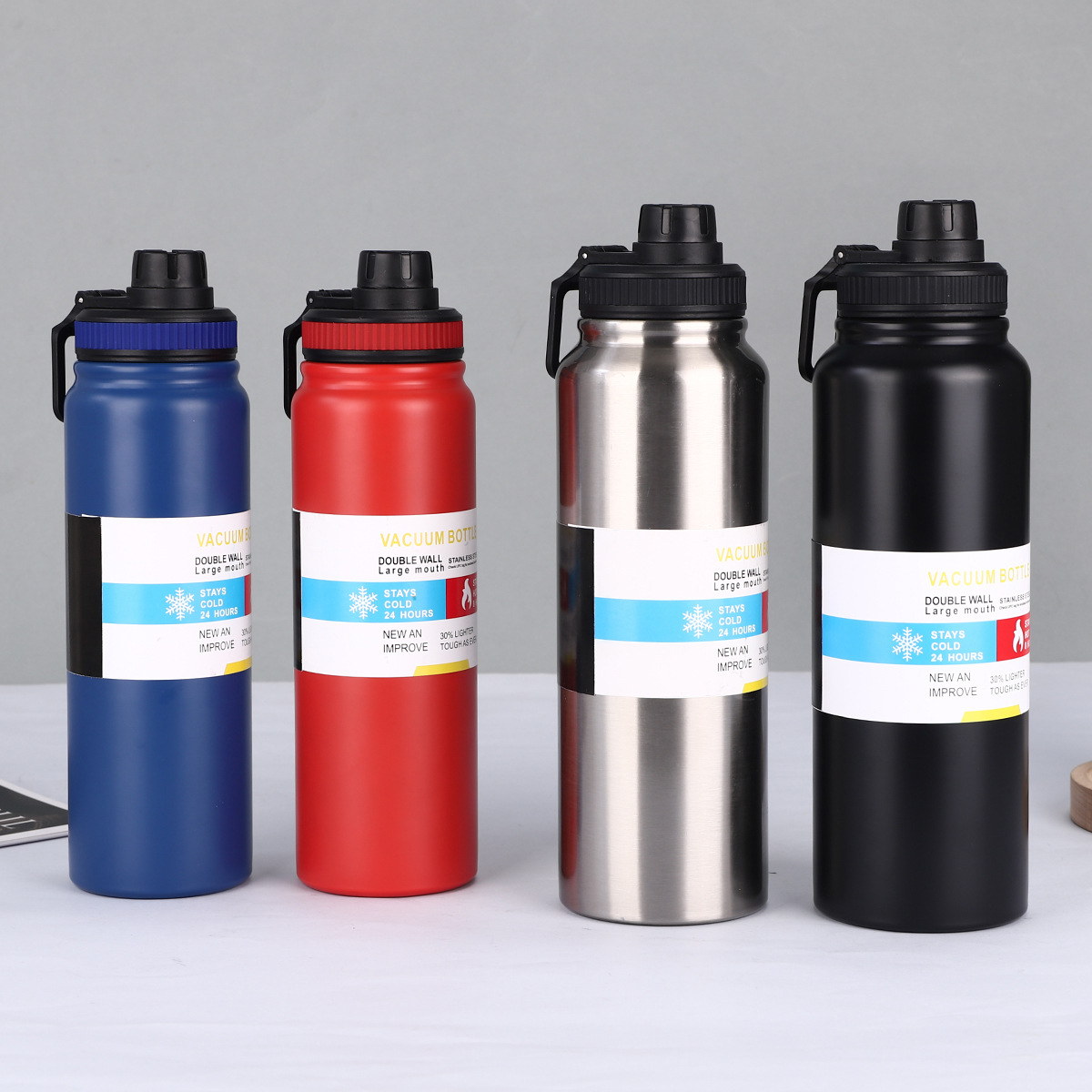 New double-layer 304 stainless steel shock-resistant portable outdoor fitness water bottle with handle for direct drinking during exercise Application Scenario