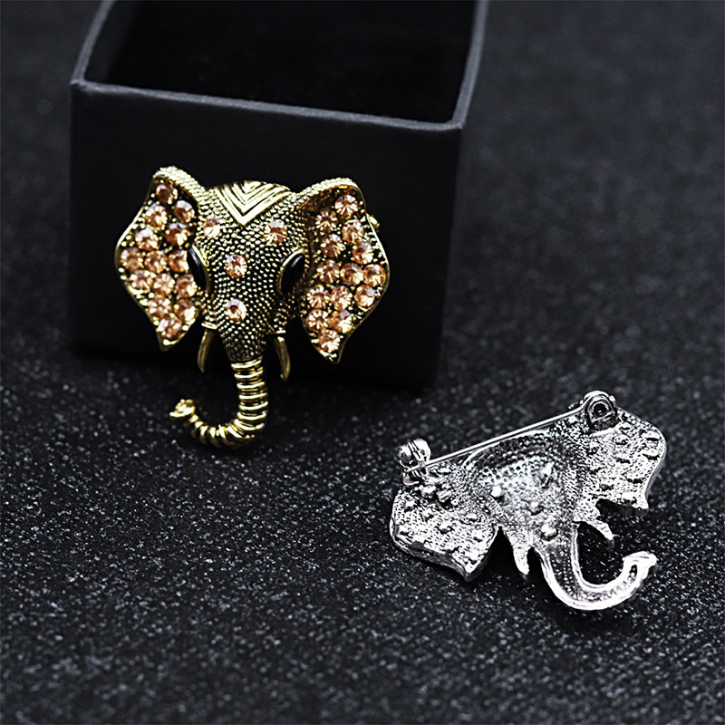 Fashionable alloy diamond-encrusted elephant head collar brooches, pins and badges that are selling well across borders from Europe and America details Picture