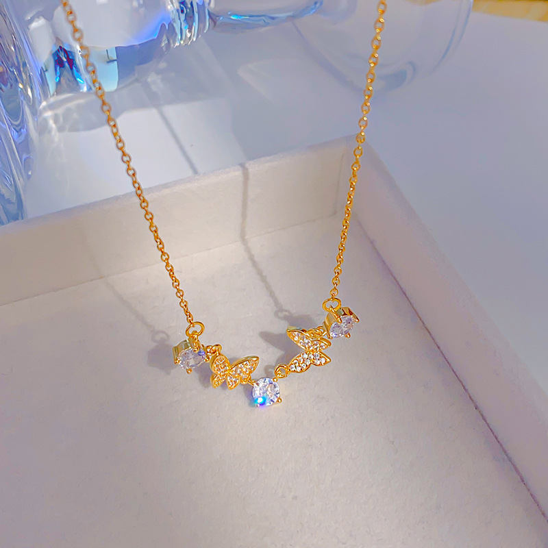 Wholesale of Korean-style fashion zircon necklace with three round diamonds and two butterfly necklaces in gold, luxurious and light luxury collarbone chain details Picture