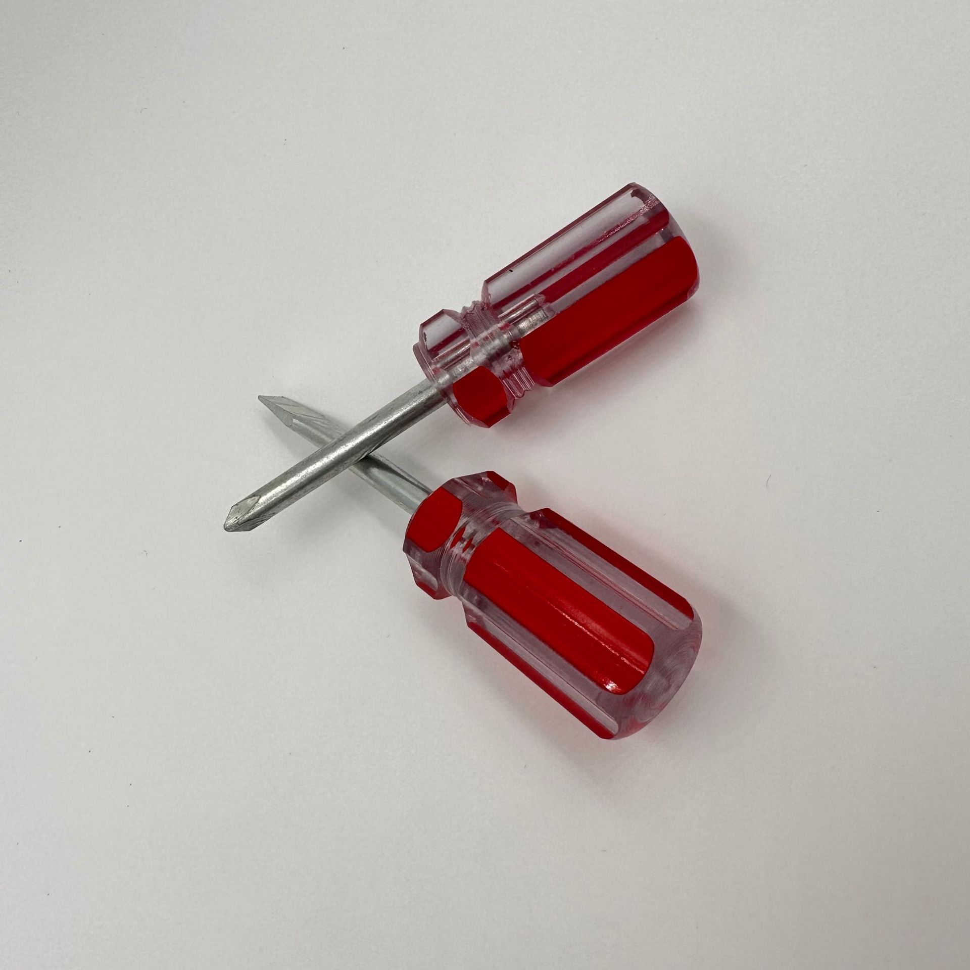 Factory direct supply of 9-centimeter-long colored striped small radish head screwdrivers with fixed cross and straight mini manual screwdrivers full figure