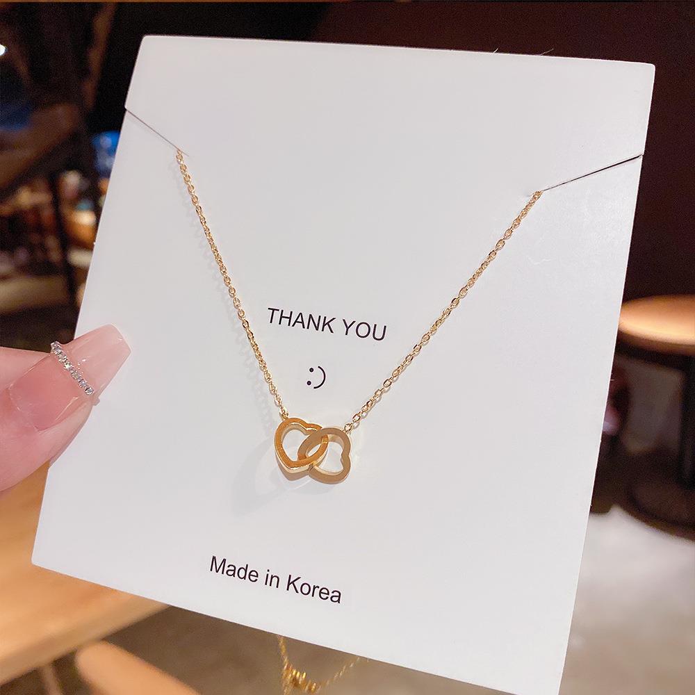 Heart-to-heart titanium steel necklace, a women's heart-shaped double-ring titanium steel collarbone chain with a niche design sense and light luxury collarbone chain Application Scenario