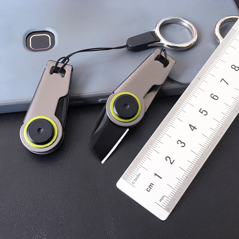 Mini zipper knife, unboxing knife, outdoor portable survival tool knife, keychain pendant, small folding knife full figure
