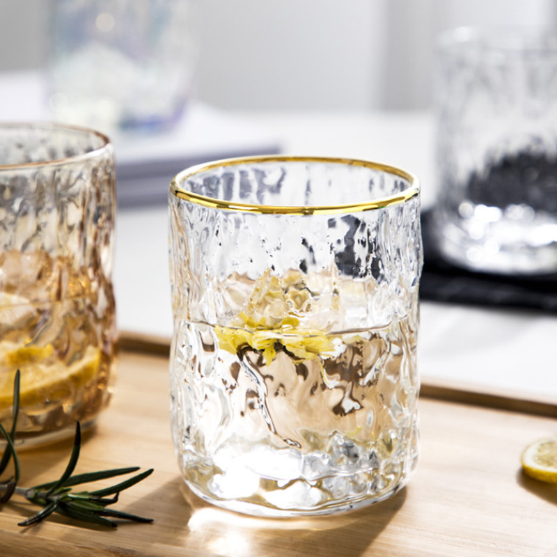 The glass cup is in an ins style, thickened with gold edges and retro embossed. It is a popular sunflower household glass cup as a souvenir Application Scenario