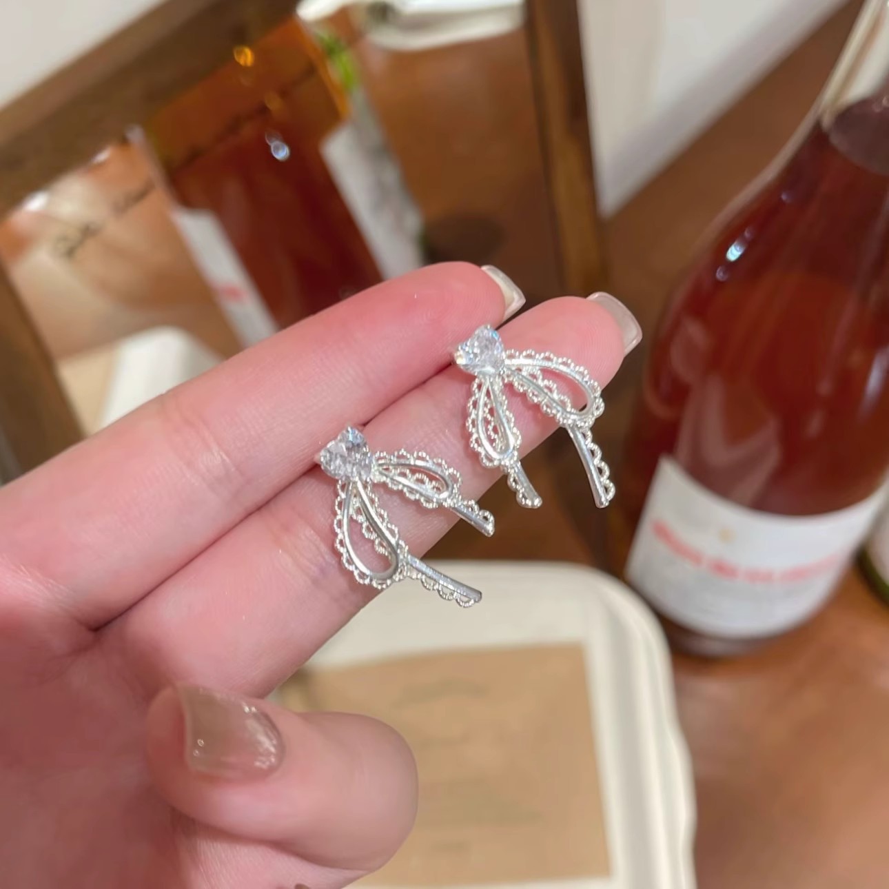 French lace bow stud s925 silver needle women's niche design exquisite and high-end earrings ribbon earrings details Picture