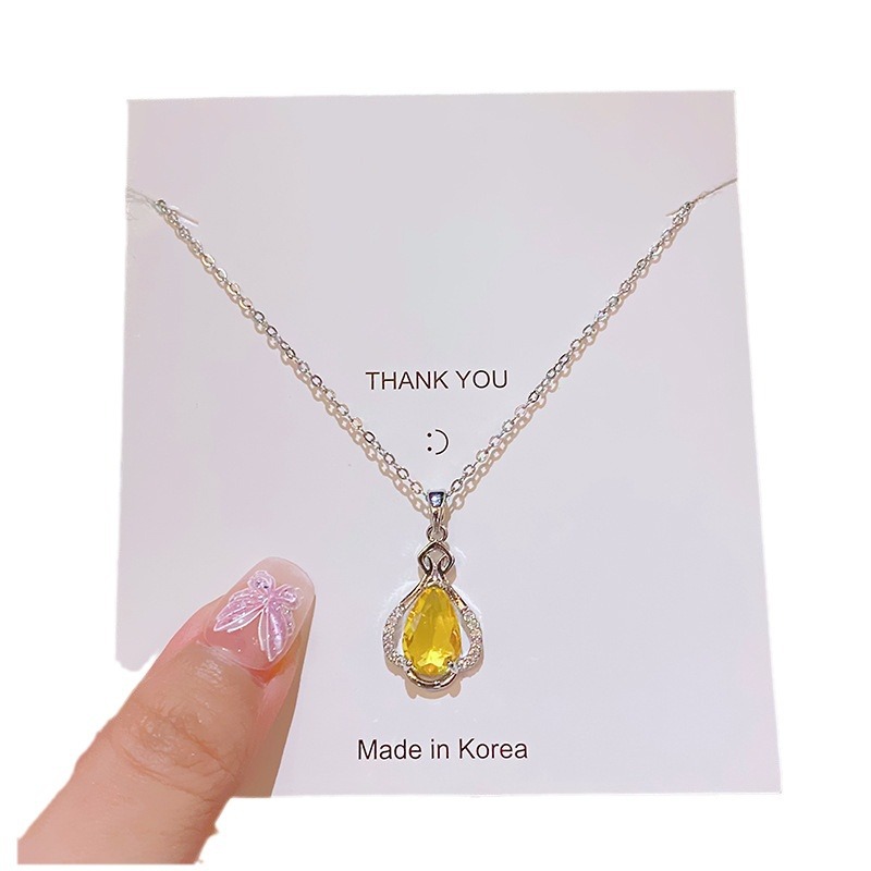Yellow water drop zircon perfume bottle pendant, titanium steel necklace, women's niche design sense, versatile collarbone chain, elegant accessory Item Picture