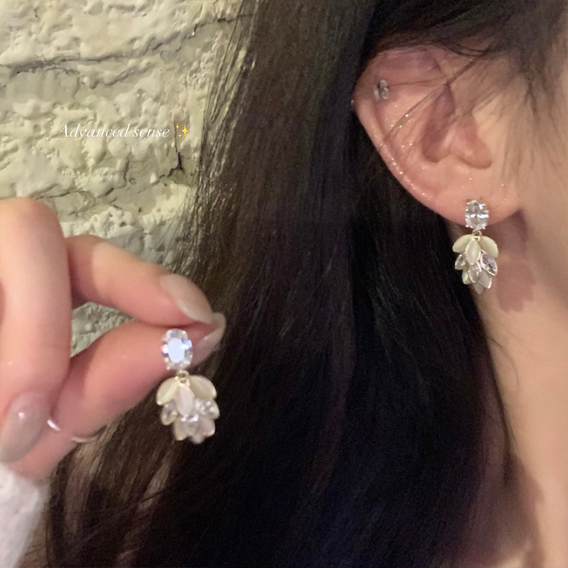 Light luxury and high-end style, zirconium flower tassel stud earrings, unique female personality, Korean-style fashionable cat's eye stone earrings details Picture