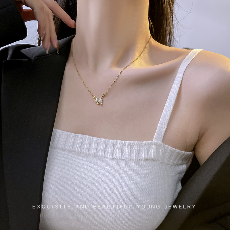 A popular and niche planetary pendant titanium steel necklace on Douyin, featuring a unique and trendy female InS-style collarbone chain accessory Application Scenario
