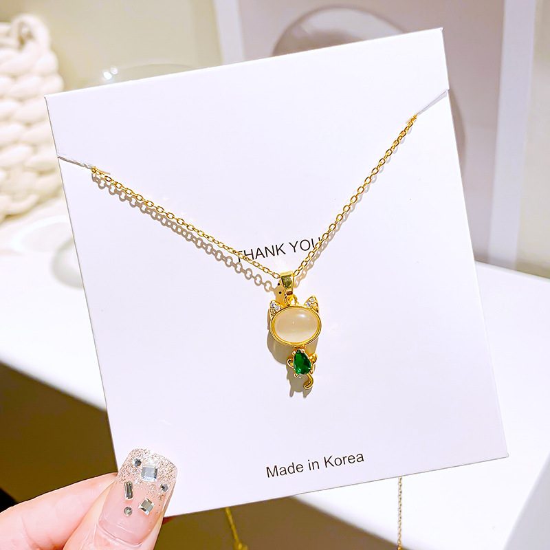 Japanese and Korean style, cat's eye stone inlaid cat pendant titanium steel necklace, women's niche design sense light luxury collarbone chain wholesale Application Scenario