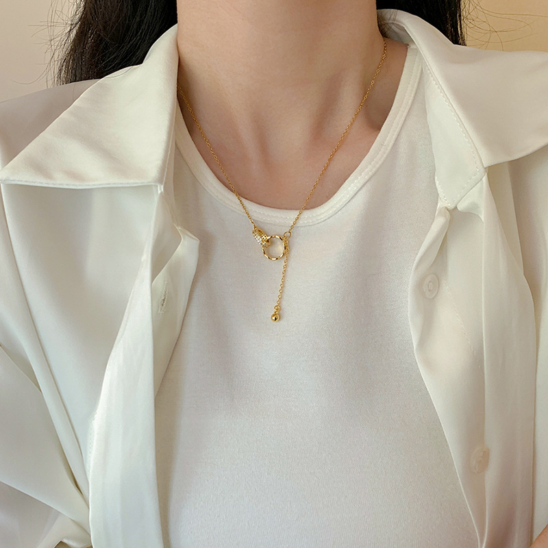 Korean InS-style golden interlocking tassel double-ring necklace, a niche and light luxury design for women, a popular collarbone chain details Picture