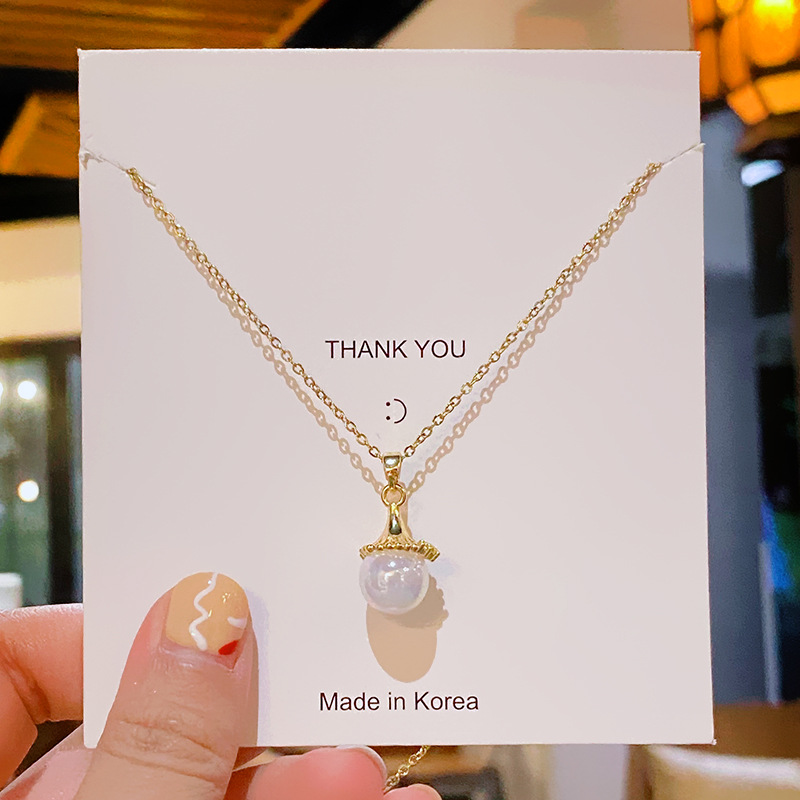 Mermaid Girl Little Pearl Titanium Steel Necklace, a fashionable, simple and light luxury collarbone chain for women, a versatile and elegant accessory for Internet celebrities, wholesale full figure