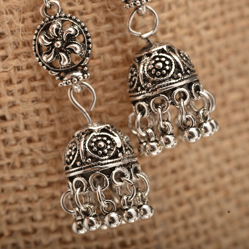 Popular earrings in tourist attractions: European and American retro ethnic style Baroque hollowed-out carved bell tassel earrings Application Scenario
