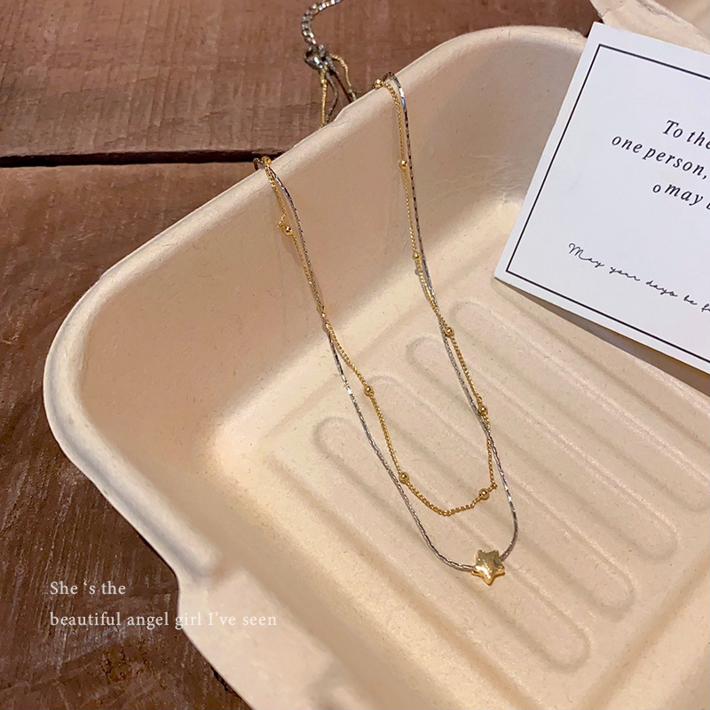 The double-layered and contrasting color necklace from Europe and America is versatile for women, exuding a sense of elegance and sophistication. It is a trendy accessory with a star-shaped collarbone chain and necklace Specification drawing