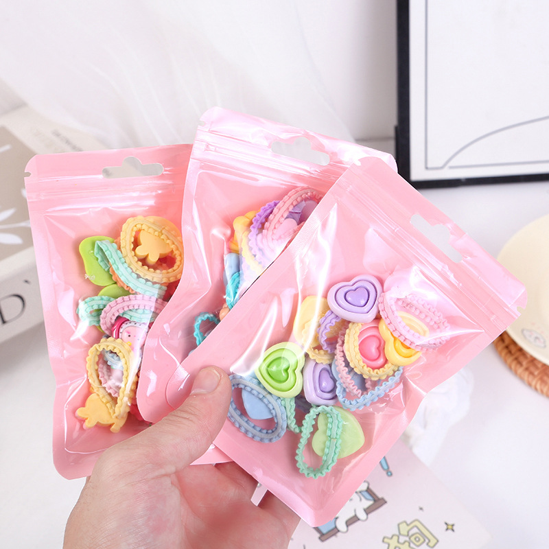 The 2024 new bagged flower-patterned hair tie for children is suitable for a 10-piece cartoon heart-shaped hair tie Application Scenario