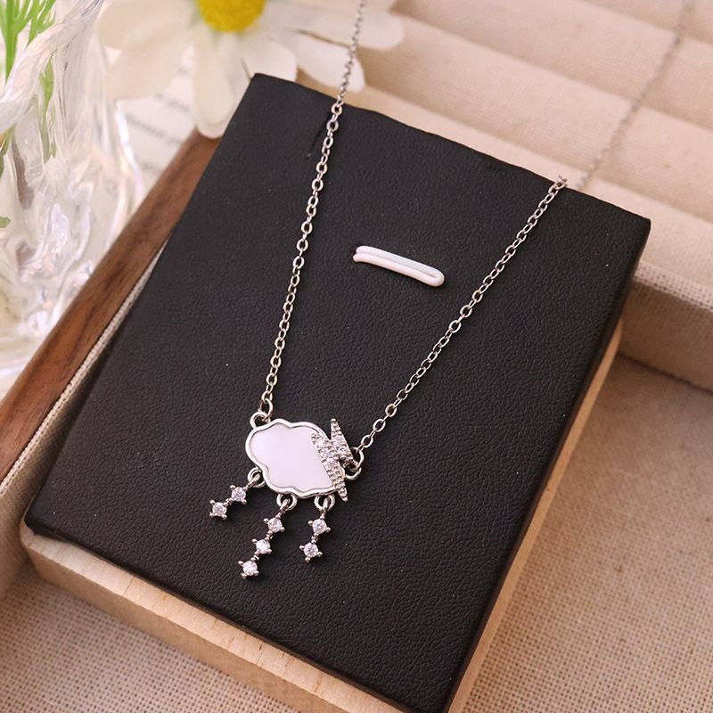Korean-style light luxury design lightning cloud raindrop pendant titanium steel necklace, versatile for women, niche collarbone chain wholesale Application Scenario