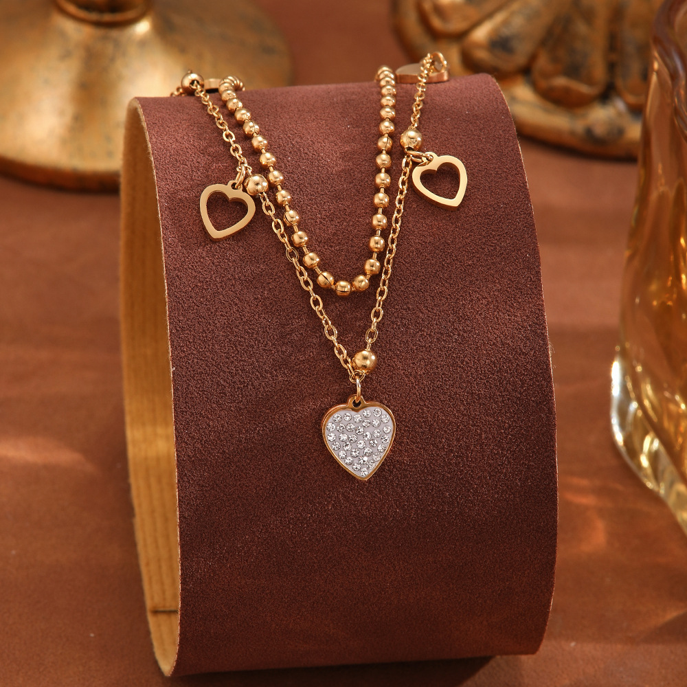 Fashionable, niche, simple and fresh titanium steel necklace, light luxury butterfly square diamond zirconia tassel gold necklace wholesale Application Scenario