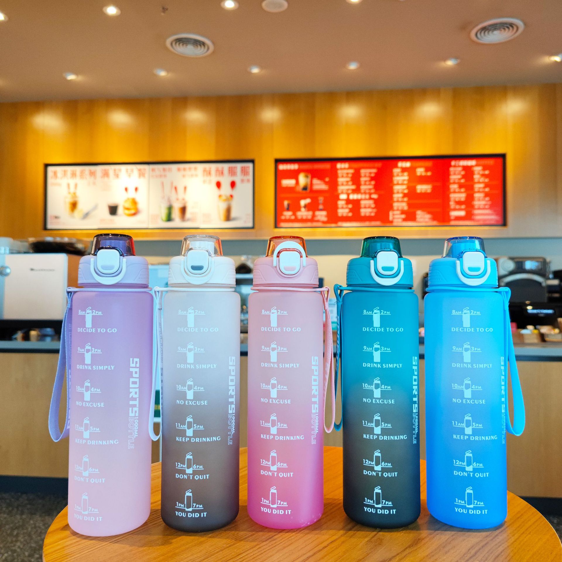 Wholesale new plastic water cup 1000ml direct drinking type with gradient color frosted strap portable lifting rope sports and fitness water bottle full figure