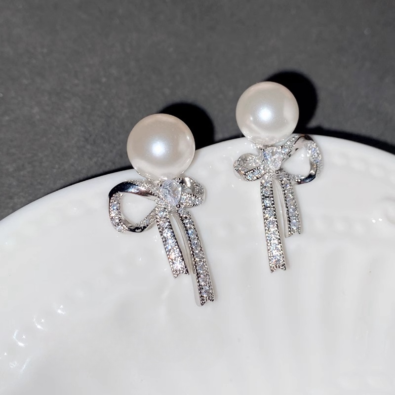 Xuhui brand exquisite and light luxury copper plated with real gold, zircon 925 silver needle, bow, pearl, fashionable and elegant stud earrings, earrings and pendants Item Picture