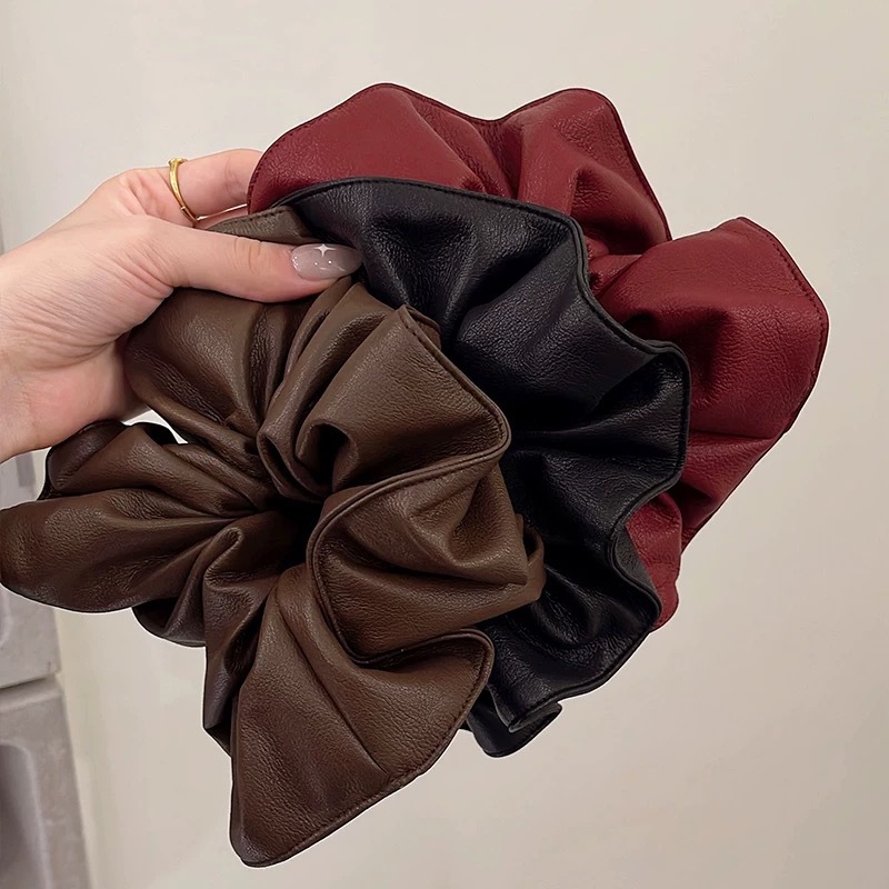 Ankela Red Leather Oversized Large Intestine Hair Band for Women's 2024 new autumn and winter collection, high-end and elegant with a large intestine hair band accessory full figure