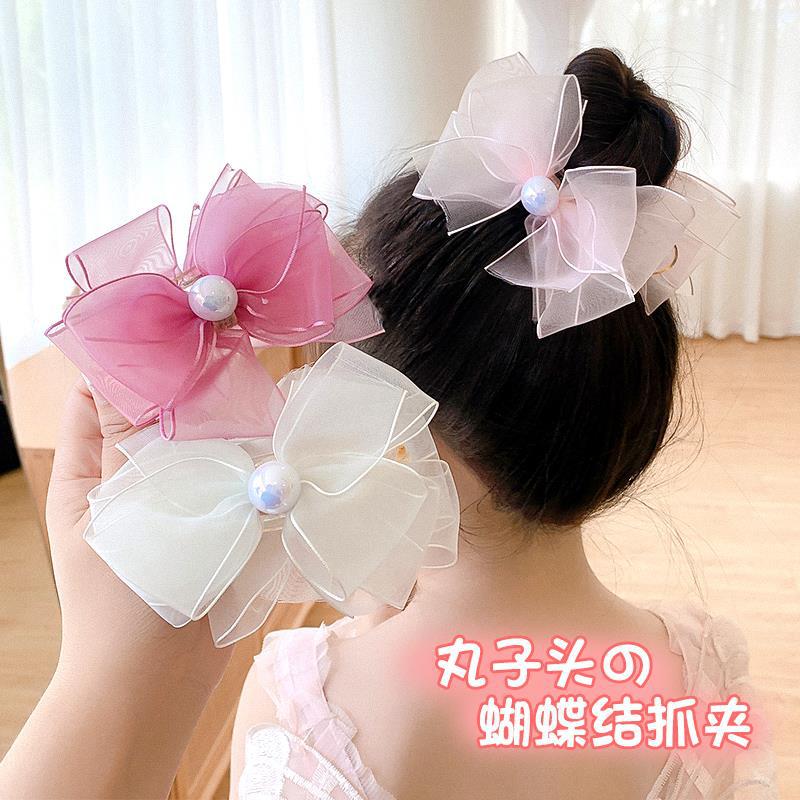 Children's hairpin headwear, sweet princess baby, bow bun hairstyle, fixed magic tool, hairpin grab, girls' hair accessory Application Scenario