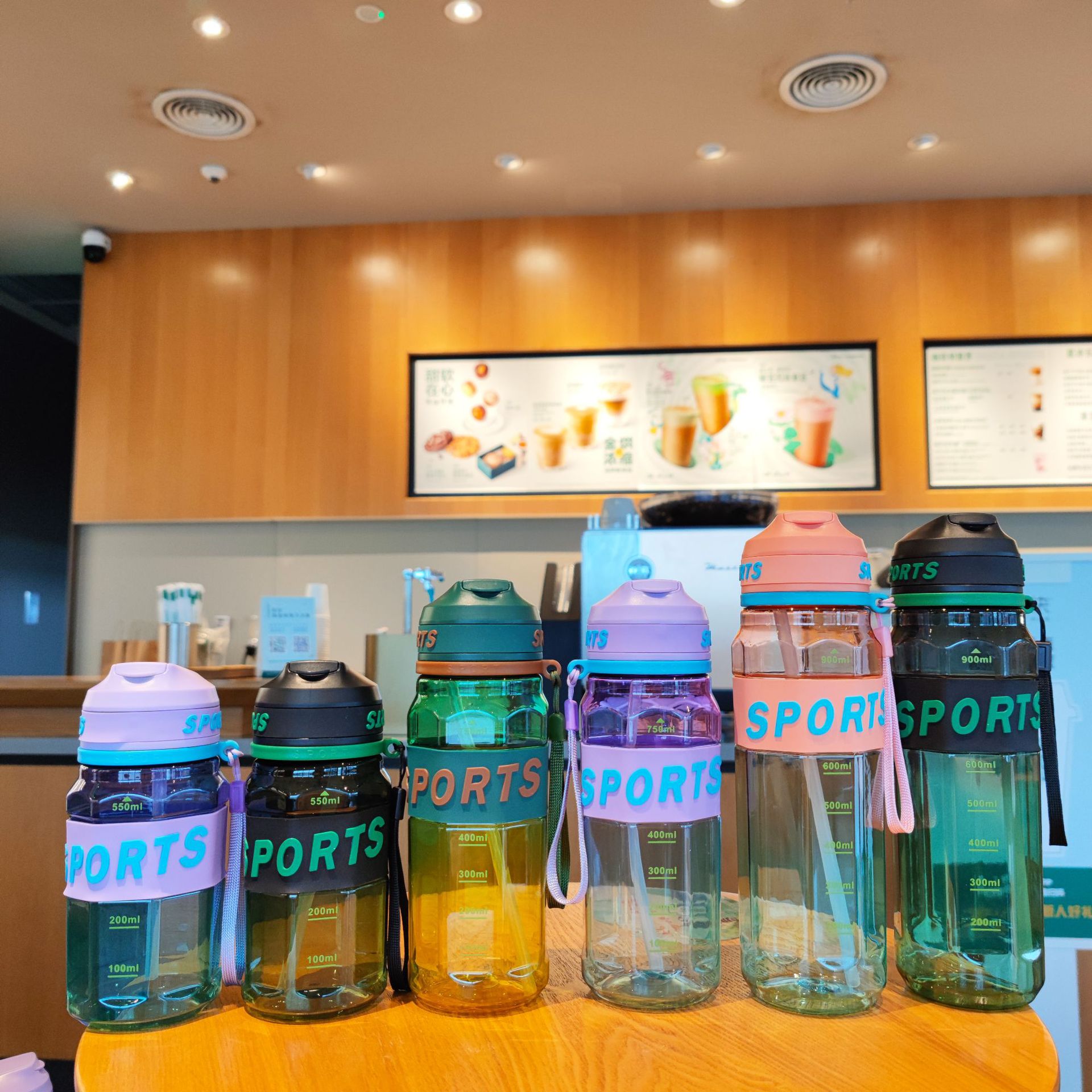 New transparent and colorful water bottle, high appearance level, straw, plastic water cup, portable handle, outdoor sports and fitness water bottle full figure