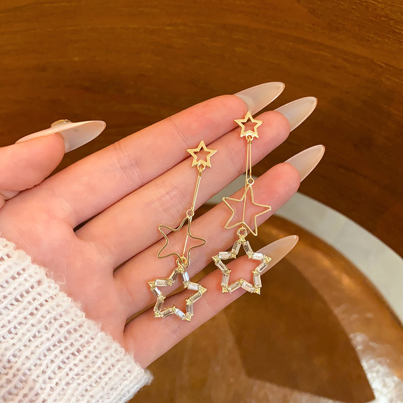 Korean bestseller Super Flash Zircon long tassel five-pointed star earrings for women, simple, fashionable and elegant star stud earrings full figure