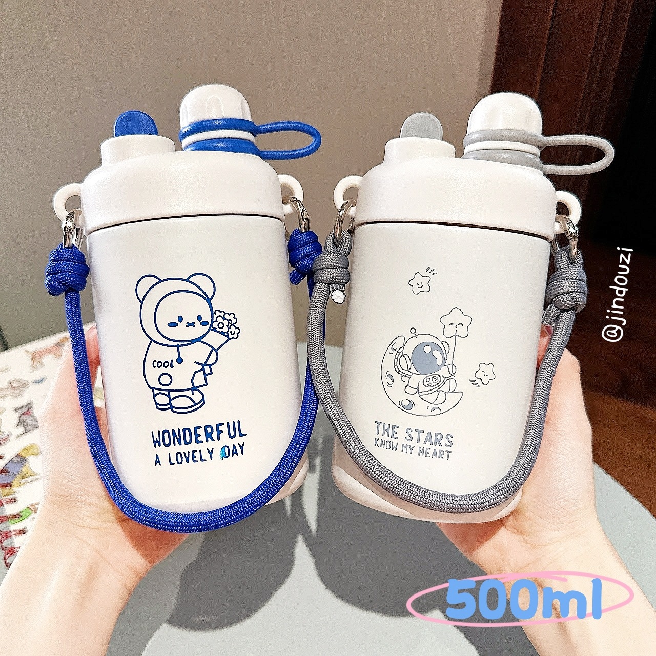 Cartoon hand-held thermos cup, astronaut cute stainless steel straw cup, student portable, high appearance level lifting rope cup full figure