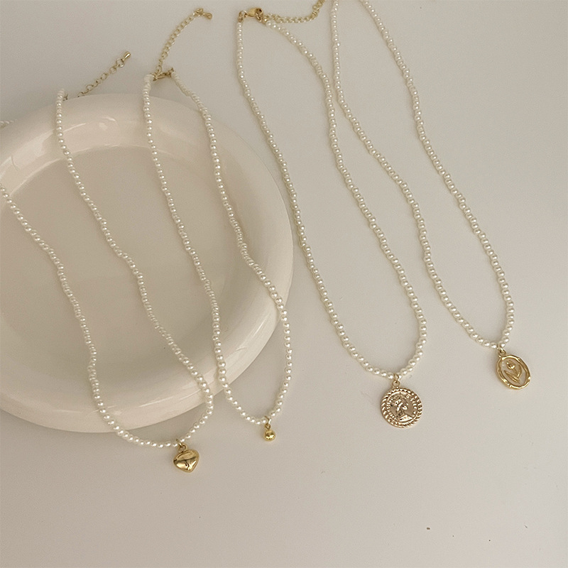 French Hepburn style retro pearl necklace, the same as Ni Ni's, women's light luxury and high-end collarbone chain, a niche and elegant necklace full figure