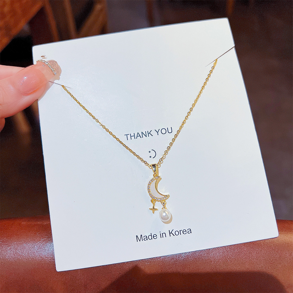 Moon and star pendant, pearl tassel necklace, trendy and luxurious titanium steel collarbone chain for women on Instagram, a popular online accessory full figure