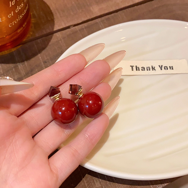 Ankela Red earrings with pearl stud earrings on both sides are a unique and light luxury item for women, exuding a high-end and retro charm full figure