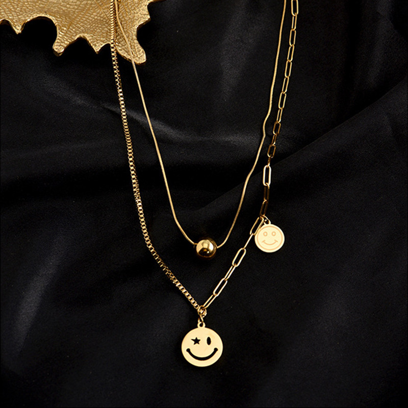 Korean version simple and individual double-layer overlapping round ball beaded expression round pendant titanium steel asymmetrical chain necklace details Picture
