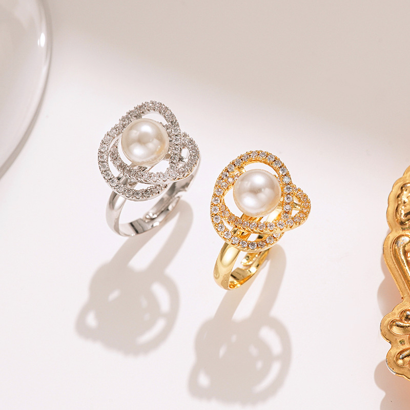 Korean-style light luxury set with zircon camellia pearl, necklace, ring, stud earrings, personalized and versatile, fashionable collarbone chain Application Scenario