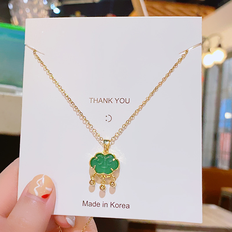 Green imitation chalcedony glass peace lock pendant titanium steel necklace women's summer light luxury high-end collarbone chain batch full figure