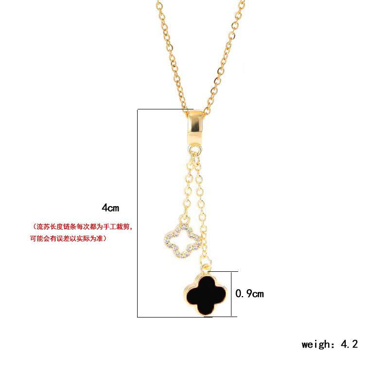Fashionable diamond-encrusted gold-plated tassel four-leaf clover pendant titanium steel necklace, a unique and versatile collarbone chain accessory for women Item Picture