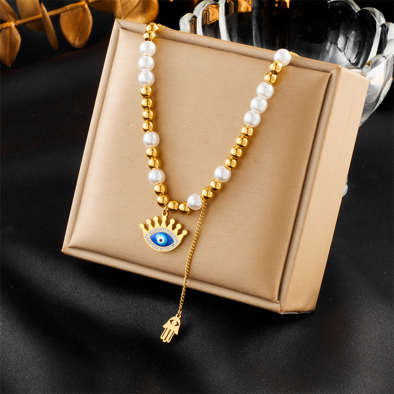 European and American fashion, niche and retro two-color beaded chain, tassel, eye palm pendant necklace full figure